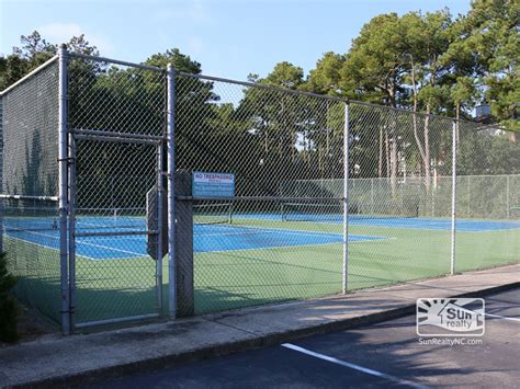 The basic dimensions of a tennis court are 78 feet in length and 27 feet in width. Kill Devil Hills OYP-C3 | Outer Banks Vacation Rentals