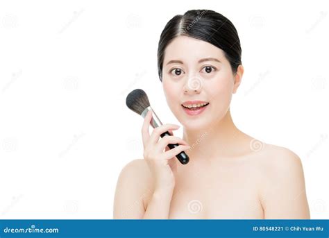 Beautiful Young Woman Applying Foundation Powder Blush With Make Stock