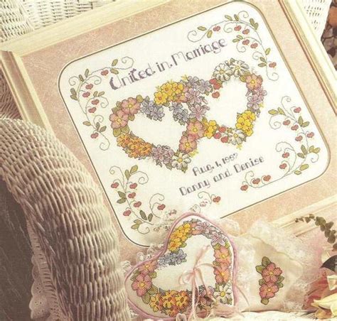 Personalised wedding samplers for any style of wedding from a religious themed church wedding to a as wedding ceremonies on the beach are becoming more popular we have designed our very own cross stitch beach wedding sampler kit. Counted Cross Stitch Wedding Sampler Flowers of the Heart