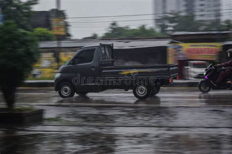 Daihatsu Gran Max Pickup Truck On The Road During Rainy Day Blurry In