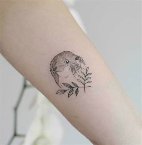 Shop 4,000+ artist designs or create your own. Otter mit Zweigen Tattoo | Otter tattoo, Tattoos, Body art ...