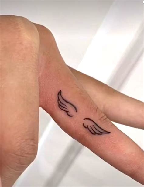 Finger Tattoos Angel Wing Finger Tattoo Thumb Tattoos Finger Tattoo Designs Hand Tattoos