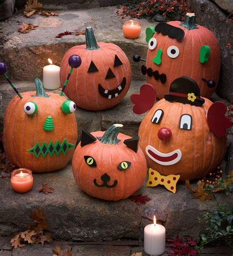 While classic carved pumpkins look great, especially when a candle is lit in them. Colorful Wooden Pumpkin Decorating Kit | HearthSong