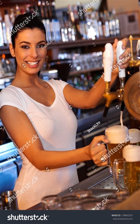 Portrait Attractive Female Bartender Tapping Beer Stock Photo 178842557