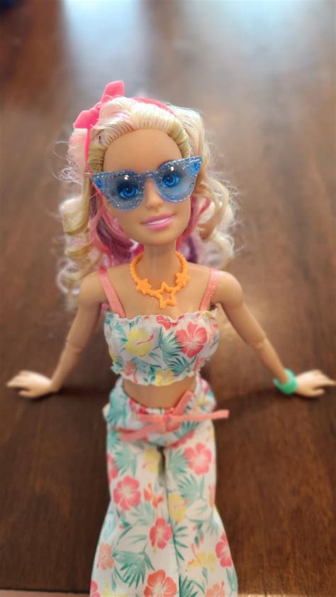 giving my sugar plum princess barbie from goodwill new life as a beach girl now to give her a