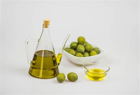Italian Olive Oil With Green Olives On Whithe Background Stock Image