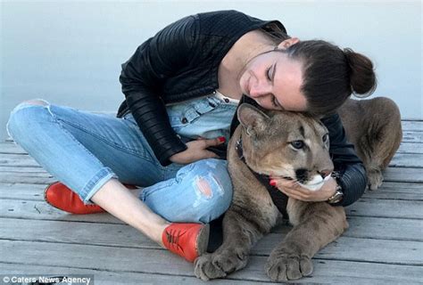 Russian Couple Adopt A Puma Who Lives With Them Daily Mail Online
