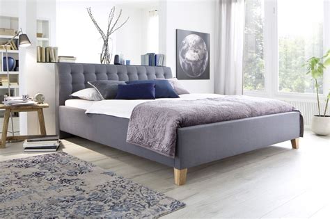 A lifestyle pleasure made of high quality solid wood which combines both sustainability and longevity elegantes bett aus extravaganten roten sheesham holz, das durch die lackoberfläche und das kubische design ein wertvolles ambiente zaubert. Polsterbett Bett Doppelbett - DENNIS -180x200 cm ...