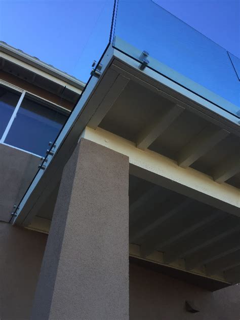 End posts, used at each starting or ending point, corner posts, used at every change of direction, and mid posts, used to support rails and cable between end and corner posts. Glass Balcony Railing Installation - Patriot Glass and ...