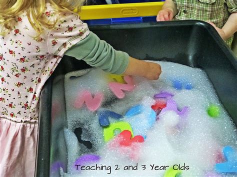 foam letters in soapy water | Preschool activities, Sensory table