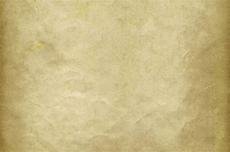 An Old And Worn Parchment Paper Photo Background Imag