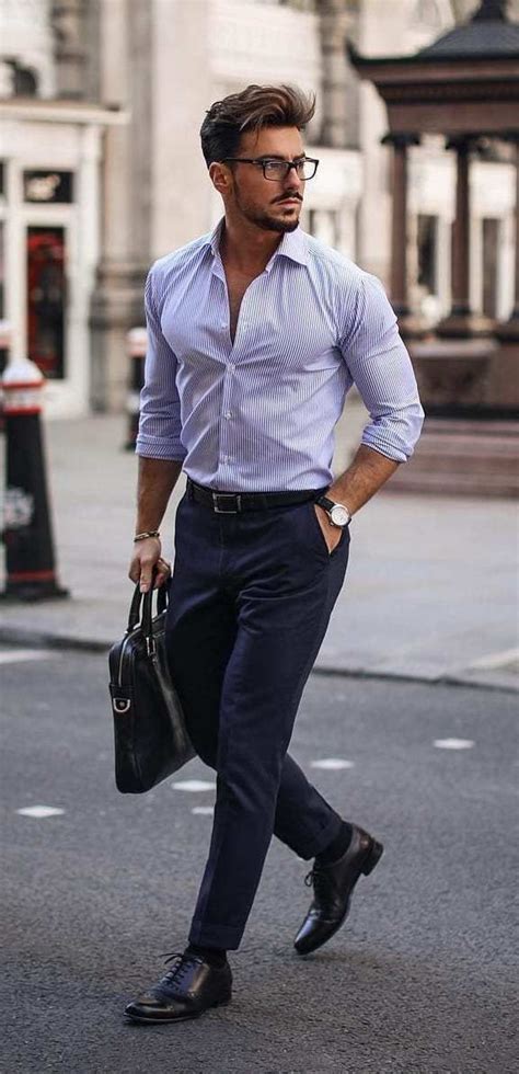 the 4 belts every guy should own in his closet blue shirt outfit men black pants outfit mens