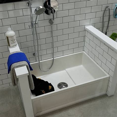 Mop washing basin aisi 304 stainless steel carcass, body and saddle spray type mixer battery in mop houses Fiat mop basin used as a pet bath. This model is about ...