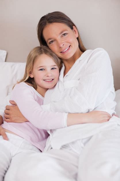 Premium Photo Portrait Of A Mother And Her Daughter Hugging