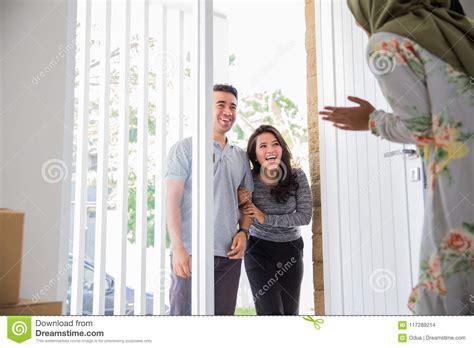 Friend visiting to house stock photo. Image of asian - 117289214