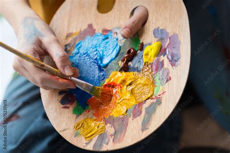 Fine Art School Closeup Of Artist Hands Holding Wooden Palette Mixing