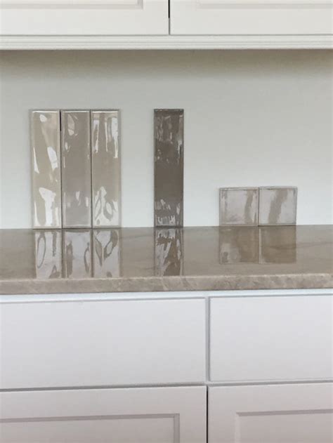 The main features of a kitchen are generally the cupboards, appliances, and the colors you choose. TAJ mahal quartzite backsplash