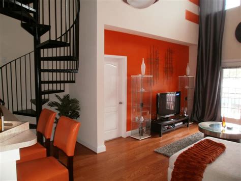 Eclectic Living Room With Bold Orange Accents Hgtv