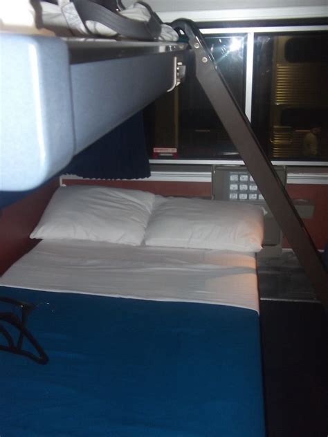 And a ziplock bag to put them in afterwards if they won't have time to dry. Amtrak exhibit - Sleeper Car - Bedroom - Unfolded beds ...