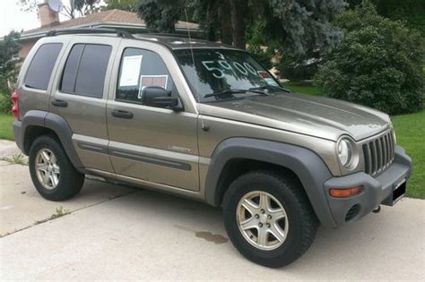 Purchase Used 2004 Jeep Liberty Tan 4x4 P235 Wide Onoff Road Tires