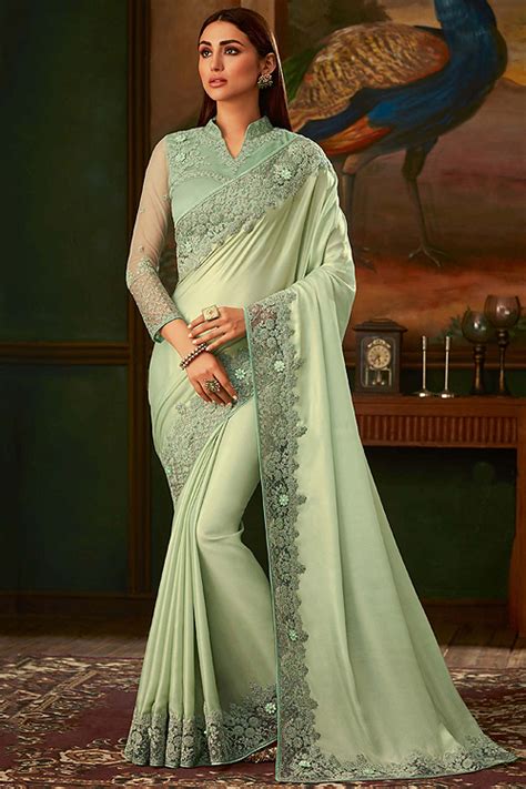 All the daintiness that sage green can offer is readily available in our stores. Buy Light Sage Green Silk Designer Saree Online | Like A Diva