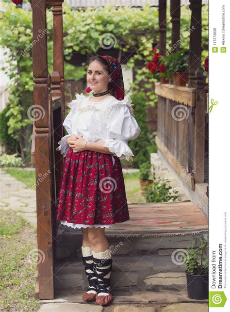 Portrait Of A Beautiful Young Woman Wearing Traditional Romanian