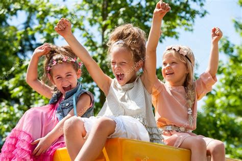 Happy Children Raising Hands And Shouting — Stock Photo © Karelnoppe