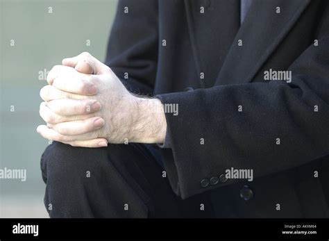 Hands Clasped Resting On Lap Hi Res Stock Photography And Images Alamy