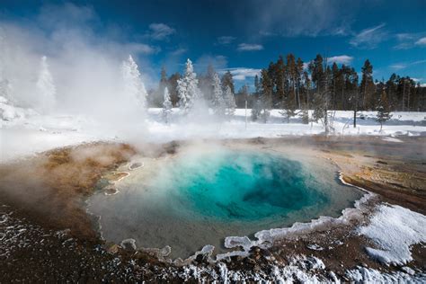 Explore Yellowstone National Parks Geysers In Winter Backpacker