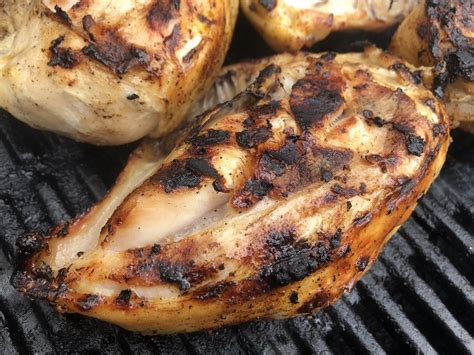 Grilled Bone In Chicken Breasts Split Skin On With Rosemary And