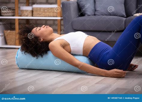 Young Woman Practicing Yoga At Home Stock Image Image Of Lying Activity 149387165