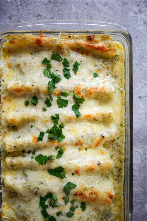 This simple sour cream enchiladas recipe are one of my go to's because they are so yummy and easy to make! Poblano Sour Cream Chicken Enchiladas - A Simplified Life