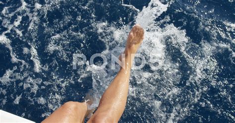 Top View Female Legs In Water Woman Splashing And Playing With Feet In Ocean Off Stock Footage