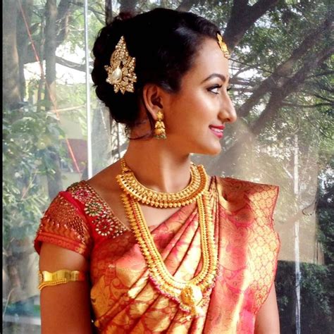 These days brides are flaunting different hairstyles and each hairstyle will leave you in total awe!! Indian bride's reception hairstyle created by Swank Studio ...