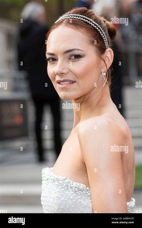 Kara Tointon Poses For Photographers Upon Arrival At The Olivier Awards