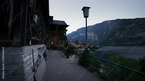 The 16th Century Hallstatt The Town Square At Dusk On Shore Of Lake