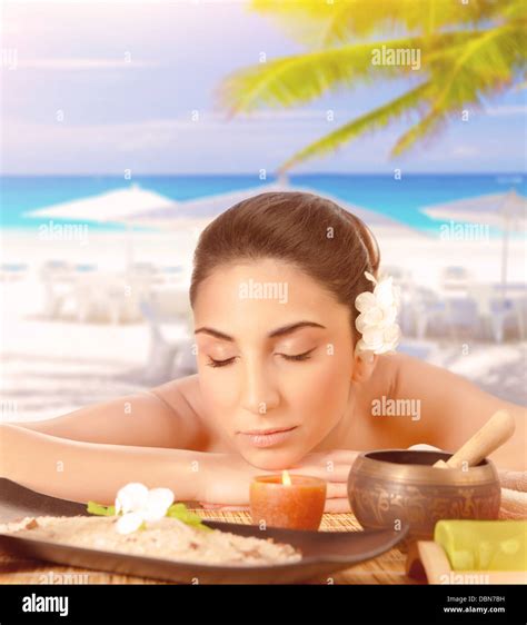 Closeup Portrait Of Pretty Woman Lying Down On Massage Table On The Beach Closed Eyes Luxury