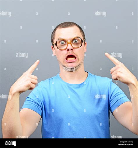 Portrait Of Angry Nerd With Huge Glasses Stock Photo Alamy