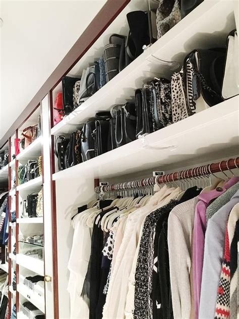 Chic Closet Boasts Stacked Bag And Purse Shelves Placed Above Clothes