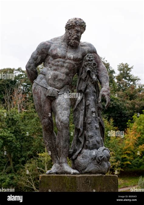 Statue Of Hercules On A Plinth Situated On The Bank Of The River Severn