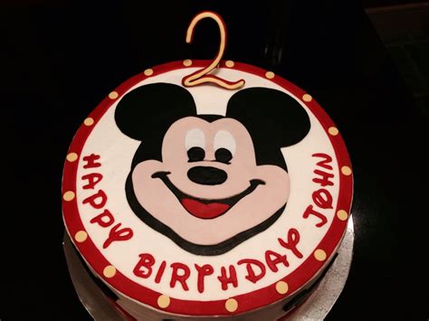 Mickey mouse first birthday cake with marshmallow fondant. Mickey Mouse birthday cake | Mickey mouse birthday cake, Mickey mouse birthday, Christmas ornaments