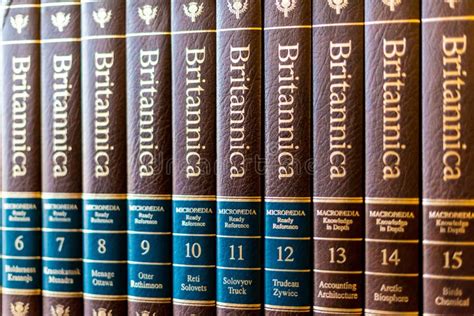 Encyclopedia Britannica Volumes On A Shelf In A Public Library