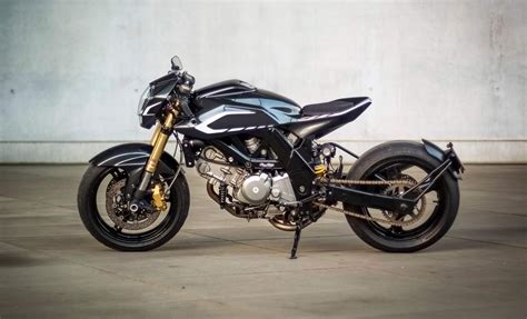 It offers decent performance and handling, for not too much cafe racer and streetfighter discussion. SV 650 cafe racer, via: http://bikebrewers.com/wp-content ...