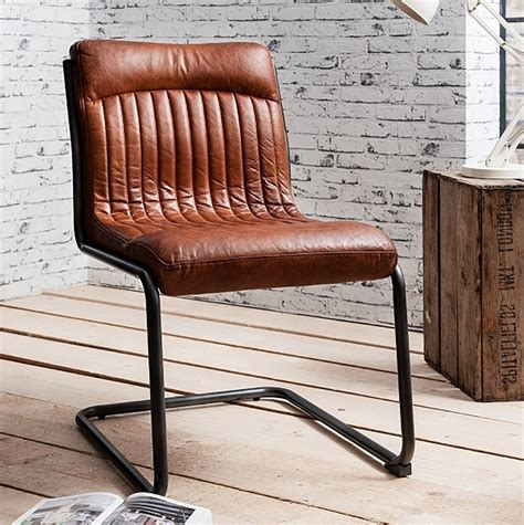 Get free shipping on qualified faux leather dining chairs or buy online pick up in store today in the furniture department. Brown Leather Industry Dining Chair - Heyl Interiors