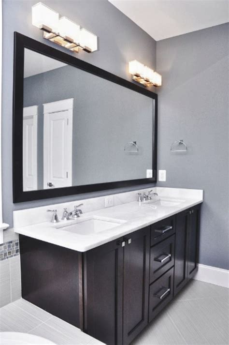 Adjust the light so that it sits over the mark you made on the wall, which should leave 3 inches between the side of the light and the side of the mirror. Bathroom Charming Bathroom Lighting Fixtures Over Mirror ...