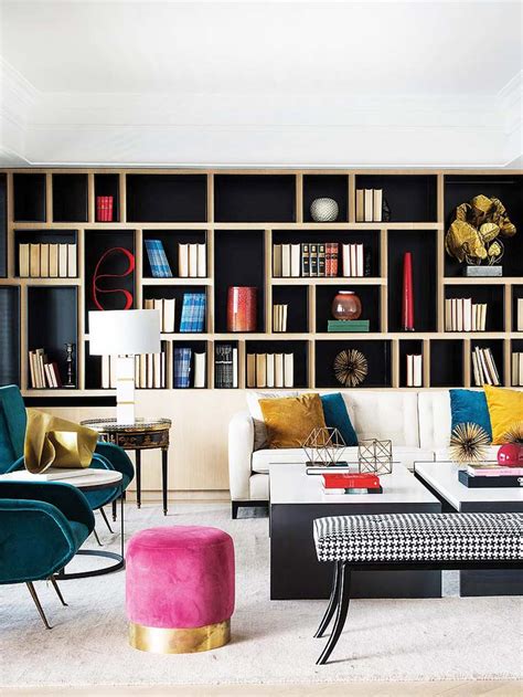 But the latest inspiration rooms we're loving place a *little* more emphasis on the bookcase's original purpose—that is, storing books. Clean Cut Glamor in a Spanish Apartment - Thou Swell