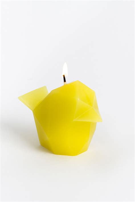 A lovely bird shaped candle reminds us that beauty is more than skin