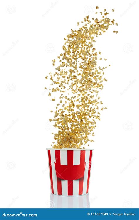 Flying Popcorn From Red And White Paper Striped Bucket Stock Image