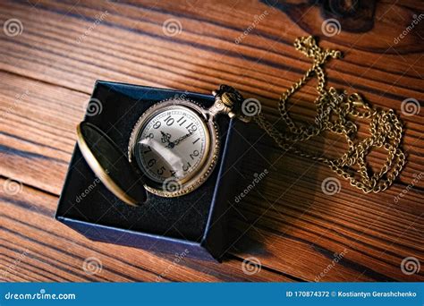 A Pocket Watch With Book Background Stock Photo Image Of Brown