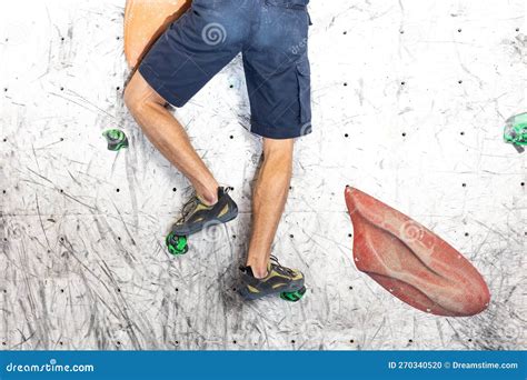 Close Up View Of Young Man Or Climber Feet In Climbing Shoes On